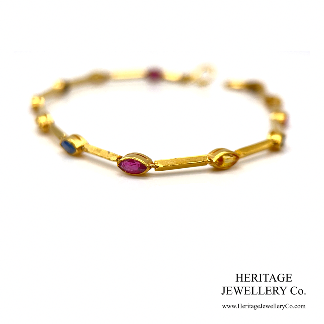 Fine Gold Bracelet set with Ruby, Sapphire and Yellow Sapphire