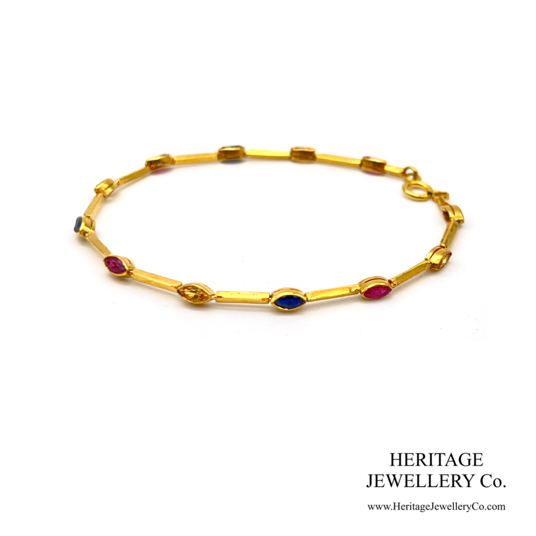 Fine Gold Bracelet set with Ruby, Sapphire and Yellow Sapphire