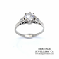 Diamond Solitaire Ring with Baguette Shoulders